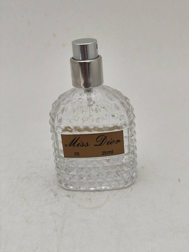 عطر جیبی زنانه میس دیور Miss Dior حجم 35 میل | رایحه گرم، تلخ و چوبی | FR