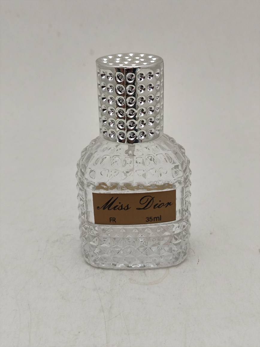 عطر جیبی زنانه میس دیور Miss Dior حجم 35 میل | رایحه گرم، تلخ و چوبی | FR